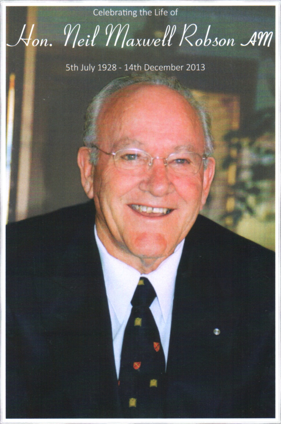 The late Hn. Neil
                              Robson AM